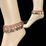 Tribe Nawaar's copper coin anklets. Great for belly dance, festivals and so much more! Image of anklets modeled.