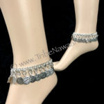 Tribe Nawaar's silver coin anklets. Great for belly dance, festivals and so much more! Image of anklets modeled.