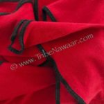 Phoenix red gaia fabric with black accent stitching from Tribe Nawaar.