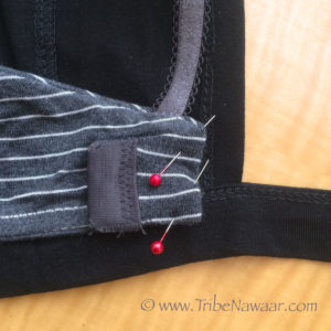 Tribe Nawaar's how to adjust the fit on your tribal belly dance choli top: pinning a bra to the choli top's rib tie section