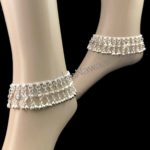 Silver belled belly dance anklets from Tribe Nawaar, modeled.
