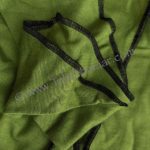 Spring green gaia fabric with black accent stitching from Tribe Nawaar.