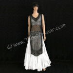 1920s black beaded & sequined tabard panel dress available thru Tribe Nawaar, shown with a white 25 yard cupcake skirt and choli top
