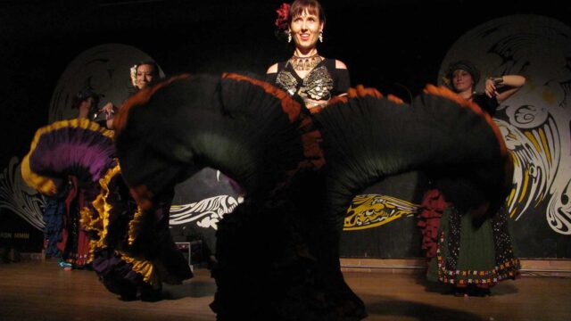 Learn how to belly dance with skirts as a prop with Tribe Nawaar
