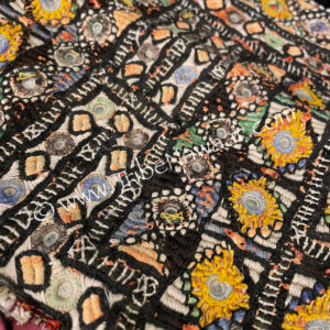 Saffron flowers clutch purse available thru The Tribe Nawaar Marketplace (detail of vintage textile)