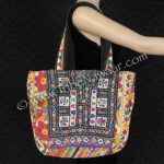 Fete nomad bag available on consignment thru The Nawaar Marketplace at www.TribeNawaar.com (view of side 2)